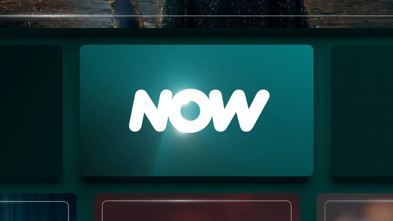 The NOW logo glowing on a tile within the streaming content grid, the platform this discovery focused on